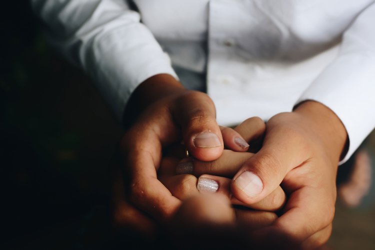 A picture of hand holding  other hands